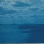 Entrance to the Harbor- Camden Hills in the distance